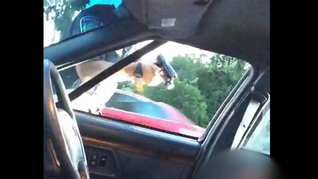 Officer Jeronimo Yanez of the St. Anthony Police Department in Minnesota points his weapon after fatally shooting Philando Castile July 6, 2016, in this screen capture from video posted by Castile's girlfriend, Diamond Reynolds. 