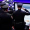 Police officers pay their respects ahead of the funeral for Officer Lorne Ahrens in Plano, Texas, on July 13, 2016. Five officers, including Ahrens, were killed in a shooting incident in Dallas on July 7, 2016. 