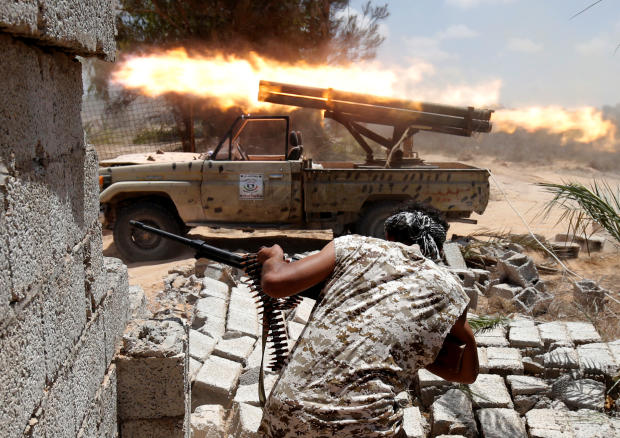 Libyan forces allied with the U.N.-backed government fire weapons during a battle with ISIS fighters in Sirte, Libya, July 21, 2016. 