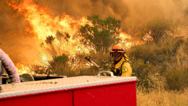 Wildfire explodes outside Los Angeles 