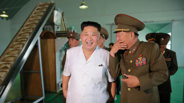 ​North Korean leader Kim Jong Un visits a fish food factory run by KPA Unit 810, in this undated photo released by North Korea's Korean Central News Agency (KCNA), July 24, 2016. 