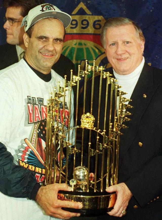 New York Yankees Manager Joe Torre poses with 1996 World Series News  Photo - Getty Images