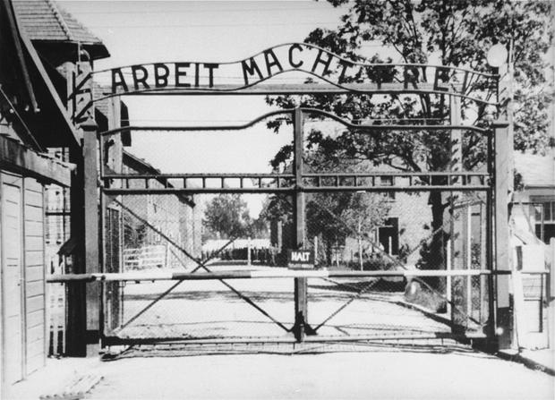 View of the entrance to the main camp of Auschwitz. United States Holocaust Memorial Museum, courtesy of Instytut Pamieci Narodowej 