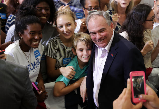 Democratic vice presidential candidate Sen. Tim Kaine poses for photos with supporters during campaign rally in Richmond, Virginia on August 1, 2016 