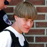 Police lead suspected shooter Dylann Roof into the courthouse in Shelby, North Carolina, on June 18, 2015. 