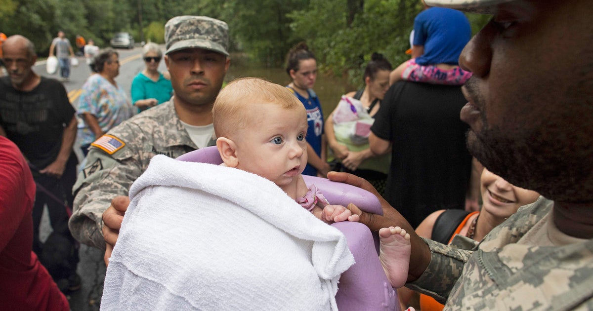 Tens of thousands rescued from historic Louisiana flooding - CBS News