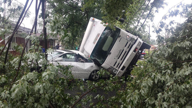 A truck was slammed against a car during severe weather in Kokomo, Indiana, on Aug. 24, 2016. 