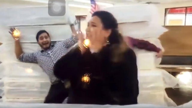 An image capture shows part of a video of a controversial online advertisement for the Miracle Mattress company in Texas. 