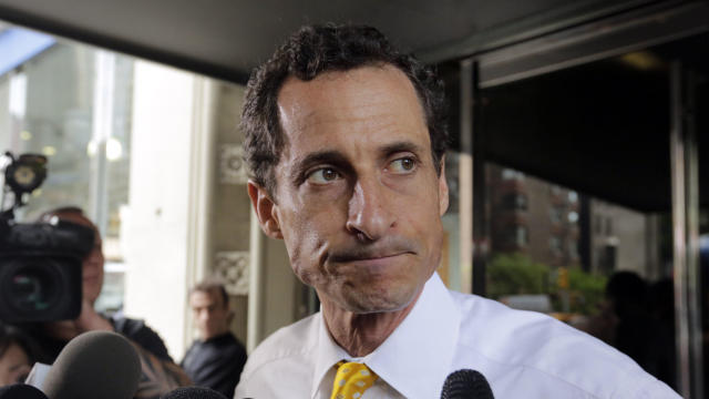 Then-New York City mayoral candidate Anthony Weiner leaves his apartment building in New York July 24, 2013. 