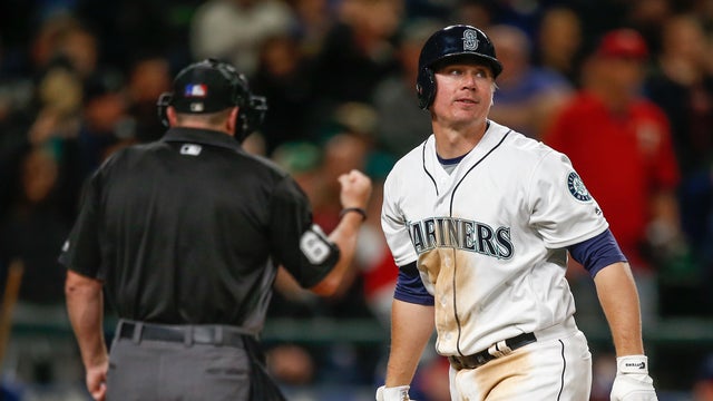 Steve Clevenger, No. 32 of the Seattle Mariners, heads back to the dugout after striking out with two runners on base to end the fifth inning against the Minnesota Twins at Safeco Field on May 28, 2016, in Seattle, Washington. 
