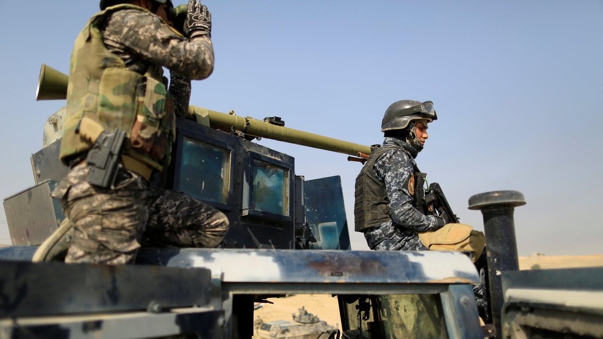 ISIS Iraq Mosul advance stalled by weather and militant holdouts - CBS News