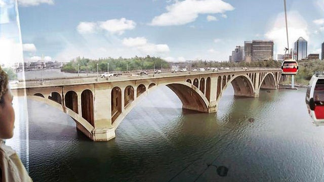 The proposed ski resort-style gondola system over the Potomac River connecting Washington and Virginia is seen in this artist rendering provided by ZGF Architects LLP. 