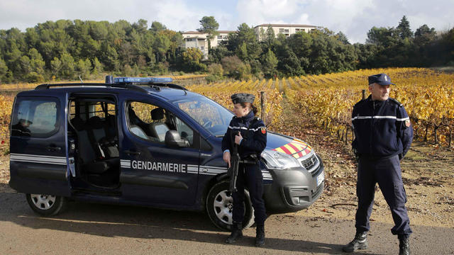 French gendarmes stand guard near a retirement home in Montferrier-sur-Lez, France, Nov. 25, 2016. 