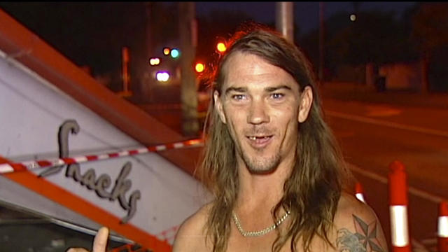 Daniel McConnell describes the scene of a car crash during a television interview Nov. 24, 2016, in Brisbane, Australia, in this photo taken from video. 