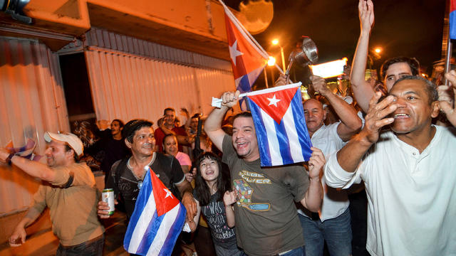 People celebrate the death of Cuban leader Fidel Castro, in Little Havana, Miami, Florida, Nov. 26, 2016. 