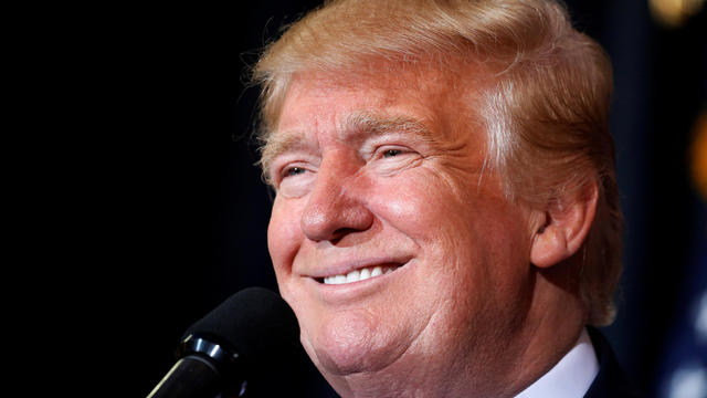 Then-Republican presidential nominee Donald Trump attends a campaign rally at the Florida State Fairgrounds in Tampa, Florida, Nov. 5, 2016. 