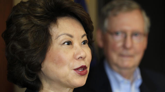 Elaine Chao and Mitch McConnell 