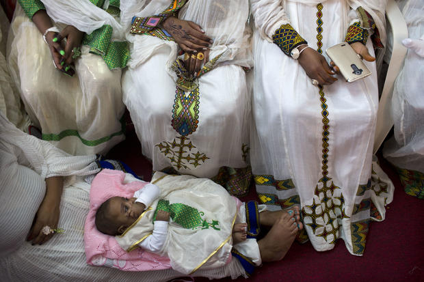 Eritrean Christian Orthodox migrant women attend a Mass at a makeshift church in Tel Aviv, Israel, April 23, 2016. Hundreds of faithful gather each week in the makeshift churches. With its walls bedecked with Christian paraphernalia, it is an unlikely sce 