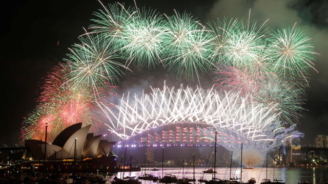 Fireworks explode over the Sydney Opera House and Harbour Bridge as Australia ushers in the new year in Sydney, Jan. 1, 2017. 