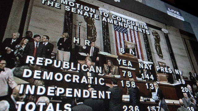 A picture of a TV screen shows the C-SPAN channel live transmission from the U.S. House of the Representatives voting for the Tax Relief Extension Act in Washington on Jan. 1, 2013. 