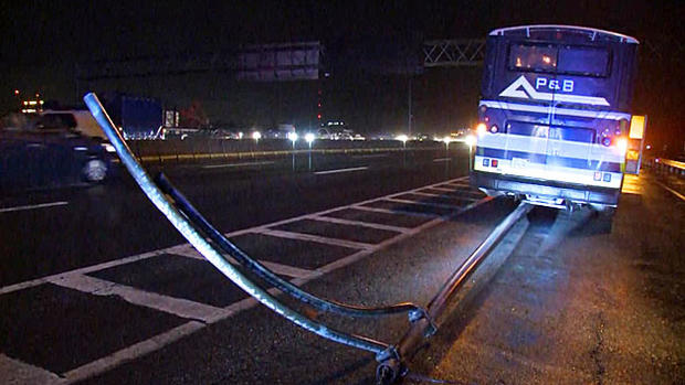 bus hits light pole expressway I-93 