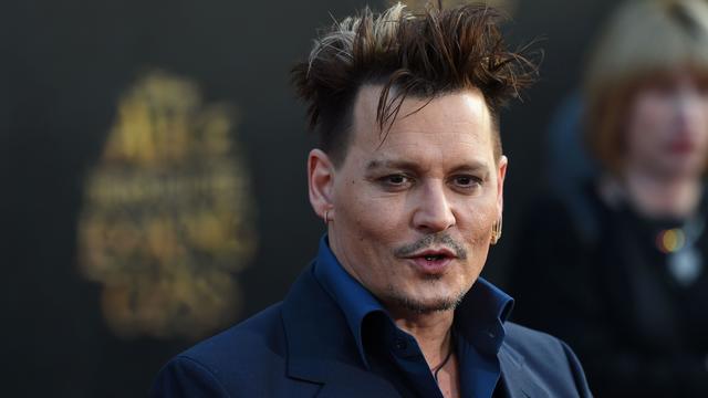 Actor Johnny Depp attends the premiere of Disney’s “Alice Through The Looking Glass,” May 23, 2016, at the El Capitan Theatre in Hollywood, California. 
