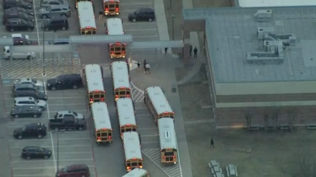 school buses outside a Little Elm school 