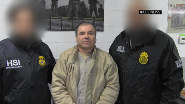 Joaquin “El Chapo” Guzman is led by agents from Homeland Security Investigations and the Drug Enforcement Administration after arriving on New York’s Long Island on Jan. 19, 2017. 