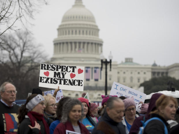 Demonstrators march past the U.S. Capitol during the Women’s March on Washington in Washington Jan. 21, 2017. 