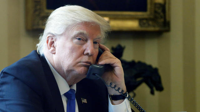 President Trump speaks by phone with Russia’s President Vladimir Putin in the Oval Office at the White House in Washington Jan. 28, 2017. 