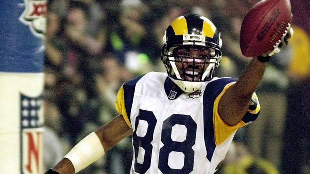 St. Louis Rams wide receiver Torry Holt holds the 