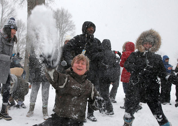 Several hundred people take part in a snowball fight on Boston Common during a winter snowstorm in Boston, Massachusetts, Feb. 9, 2017. 