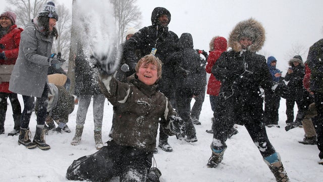 Several hundred people take part in a snowball fight on Boston Common during a winter snowstorm in Boston, Massachusetts, Feb. 9, 2017. 