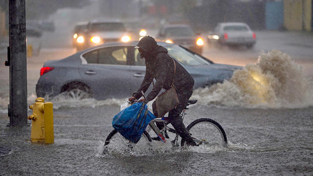 Flooded Street, Bicyclist, Traffic, Strongest Storm In Six Years Slams Southern California 