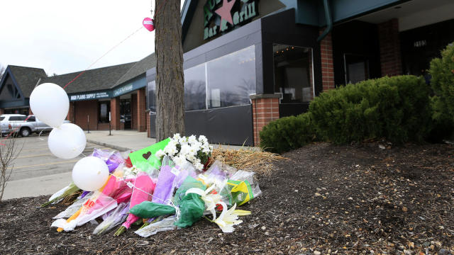 A small memorial for Srinivas Kuchibhotla is displayed outside Austins Bar and Grill in Olathe, Kan., Feb. 24, 2017. 