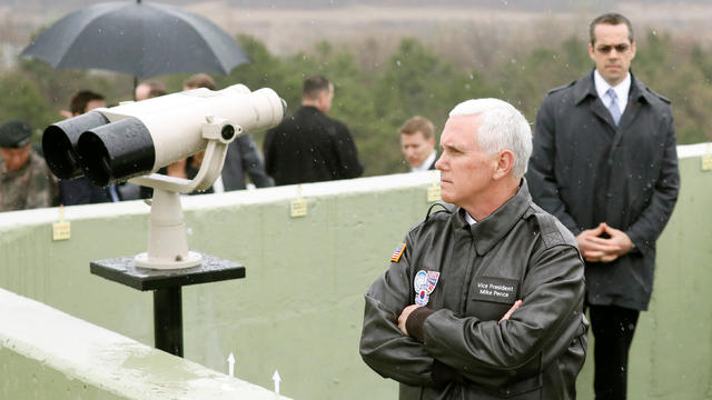 Vice President Mike Pence looks toward the north from an observation post inside the demilitarized zone separating the two Koreas on April 17, 2017. 