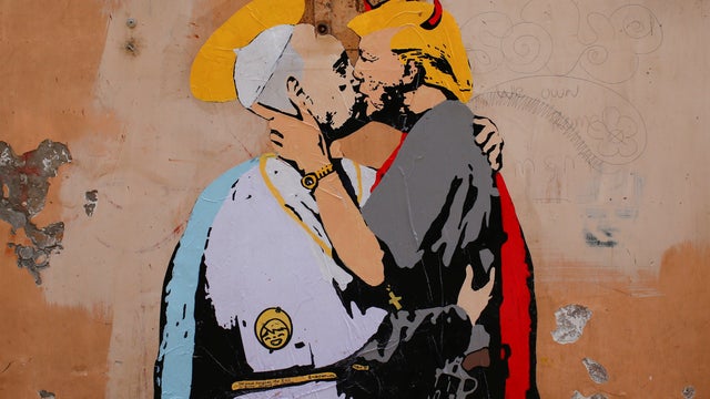 2017-05-11t132405z-747257110-rc1e0085f090-rtrmadp-3-pope-trump-mural-kiss.jpg 