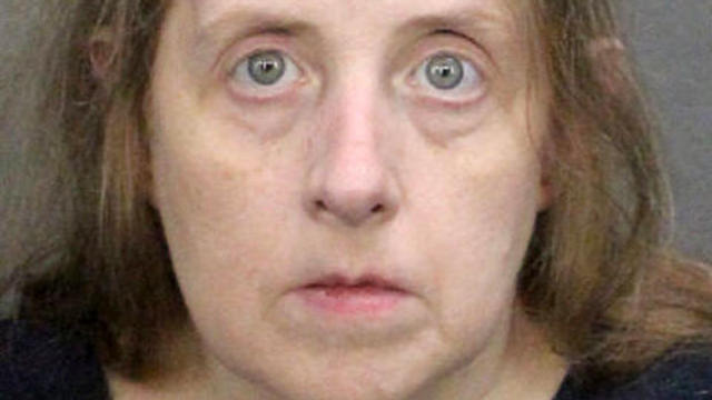 Lucy Richards, 57, charged with threatening a parent of one of the children killed in the 2012 massacre at Sandy Hook Elementary School in Sandy Hook, Connecticut, is shown in this booking photo in Fort Lauderdale, Florida, that was provided on June 7, 20 