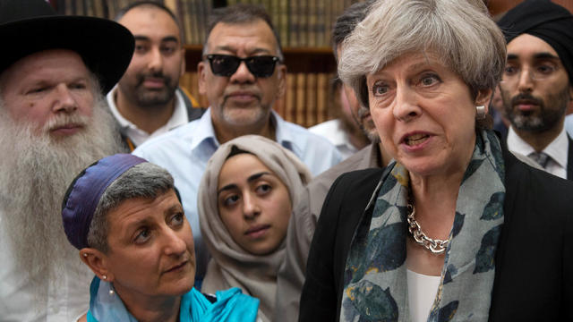 Britain's Prime Minister Theresa May speaks to faith leaders in Finsbury Park Mosque, near the scene of an attack in London, Britain, June 19, 2017. 
