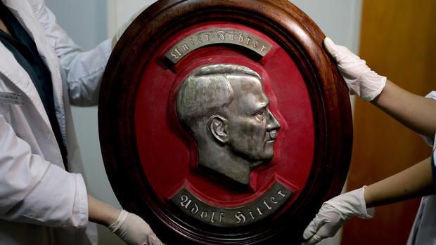 Trove of suspected Nazi artifacts found in hidden room 