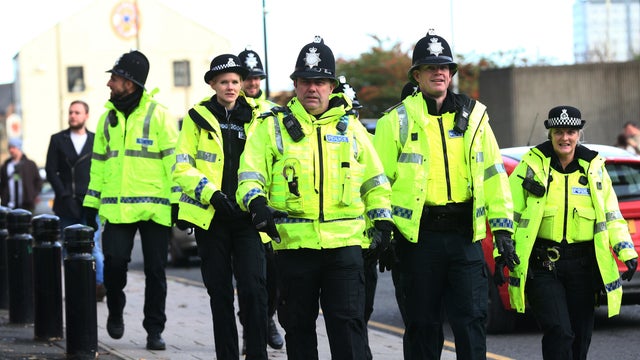 Police officers patrol outside St. James' Park ahead of a Barclays Premier League match on Nov. 21, 2015, in Newcastle Upon Tyne, England. 