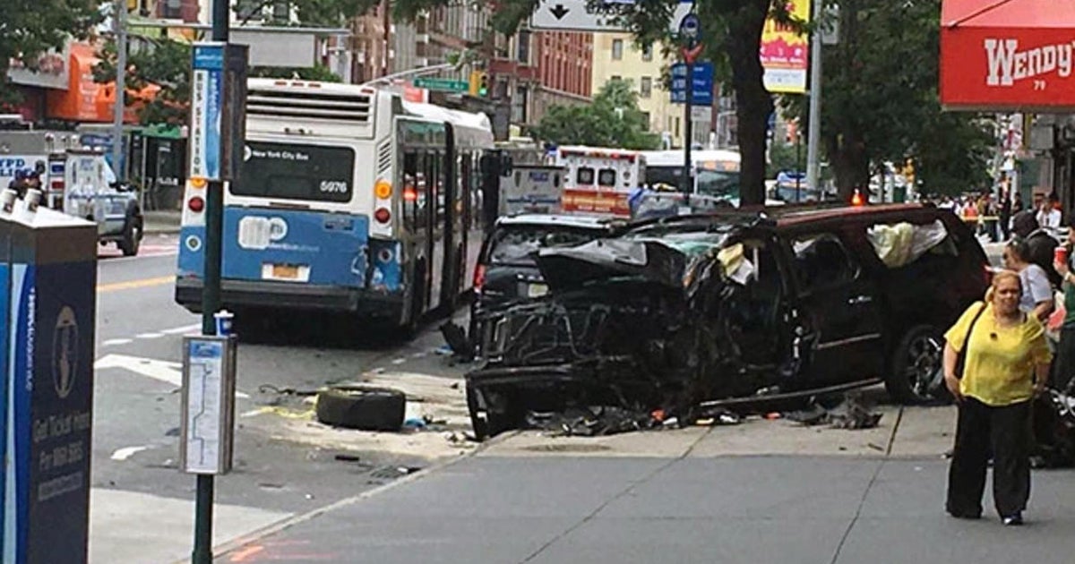 12 injured after SUV strikes city bus, jumps curb in New York City ...