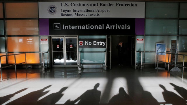 An international traveler arrives at Logan Airport in Boston, Massachusetts, on Jan. 30, 2017, after President Trump issued an executive order travel ban. 