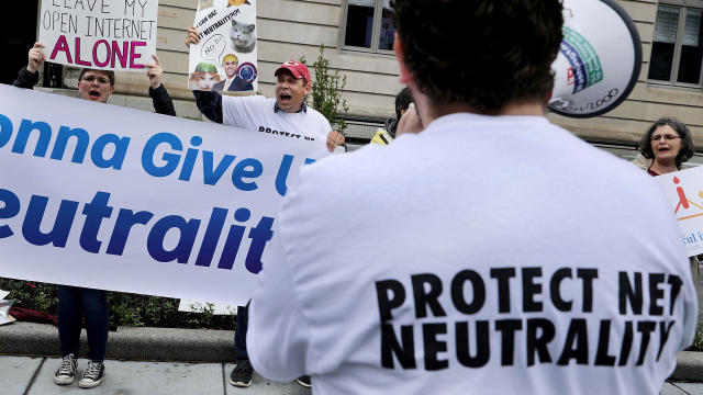 Proponents of net neutrality protest against Federal Communication Commission Chairman Ajit Pai outside the American Enterprise Institute before his arrival May 5, 2017, in Washington. 