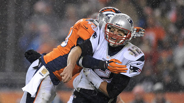 Tom Brady hit by Broncos' Shaquil Barrett 