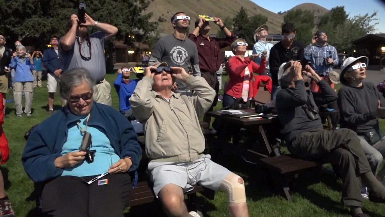 Star students hold special class reunion under solar eclipse - CBS News
