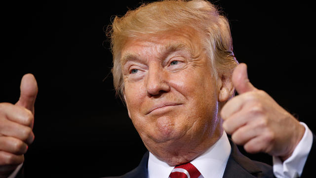 U.S. President Donald Trump gives the crowd a thumbs up at a campaign rally in Phoenix, Arizona 