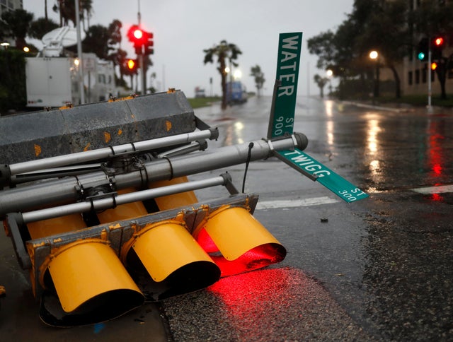 Traffic lights lie on a street after being knocked down, as Hurricane Harvey approaches in Corpus Christi 