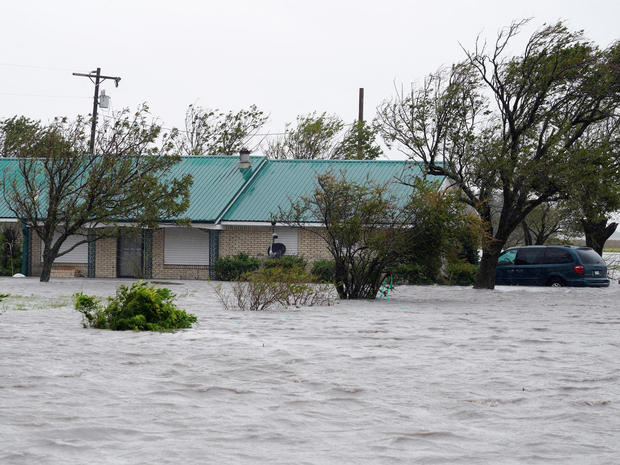 A ranch house is surrounded by floodwaters from Hurricane Harvey near Port Lavaca 