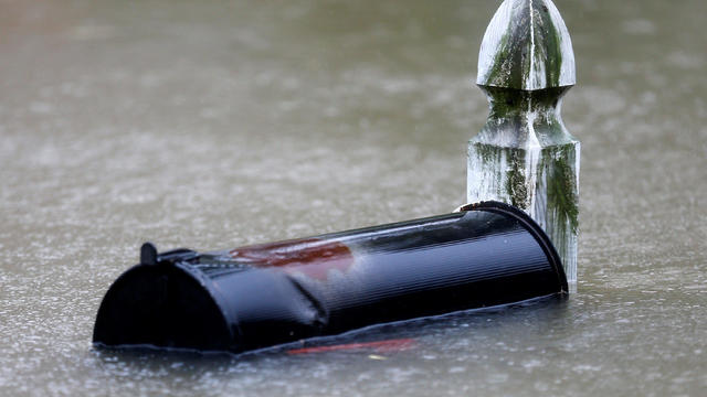 A submerged mailbox from the floodwaters of Tropical Storm Harvey is seen in Houston's Beaumont Place neighborhood on Aug. 28, 2017. 